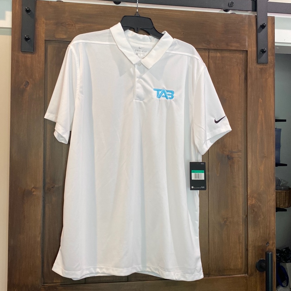 E858 NWT Men's Sz. XL Nike Polo White w/ TAB logo
